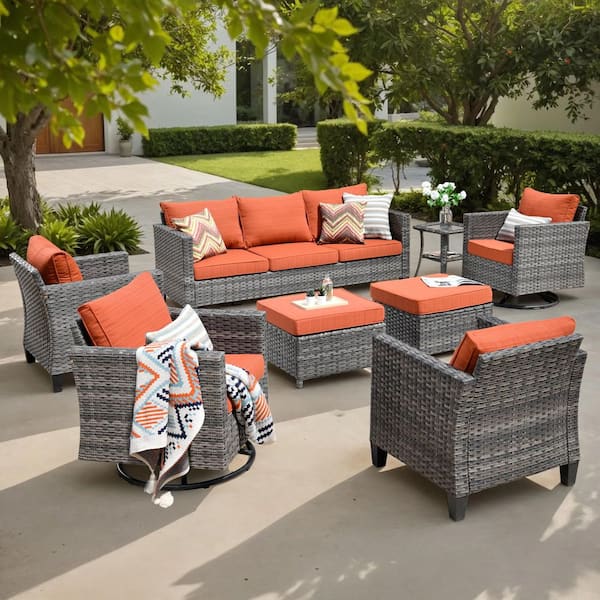 Camden 8-Piece Wicker Patio Furniture Outdoor Patio Conversation Set with Orange Red Cushion, Swivel Chair and Ottoman