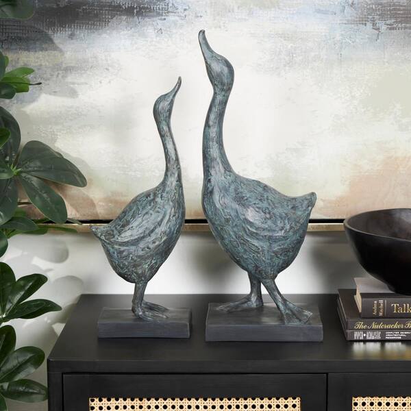 Litton Lane Blue Resin Bird Sculpture with Abstract Texturing Set of 2