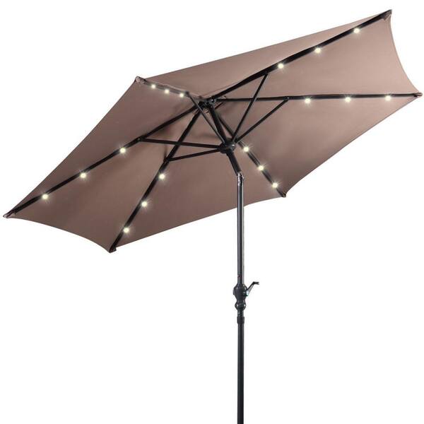 tan patio umbrella with lights