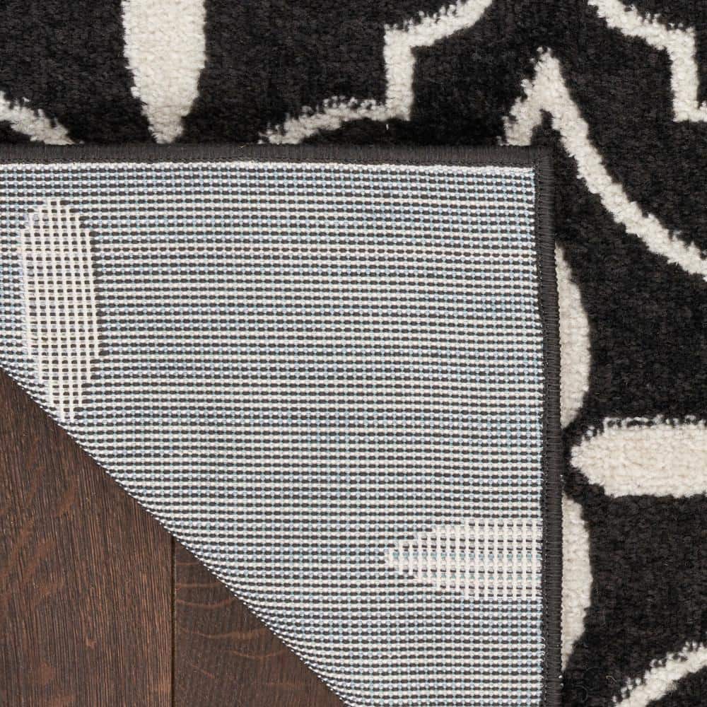Black and Ivory Reversible Synthetic Runner Rug, 2'2" x 7'6"