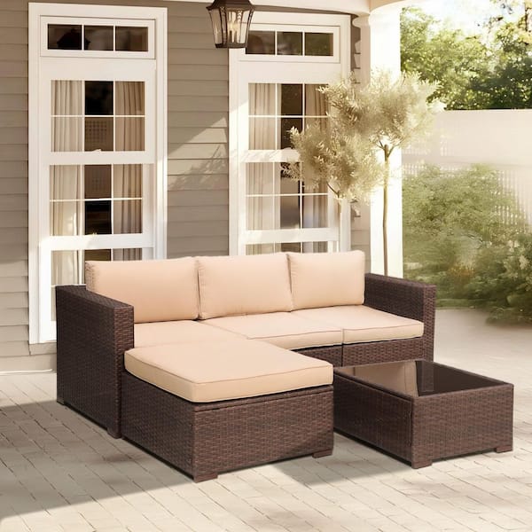 Freestyle 5-Piece Wicker Brown Outdoor Patio Conversation Seating Sofa Set with Ottoman and Coffee Table, Beige Cushions