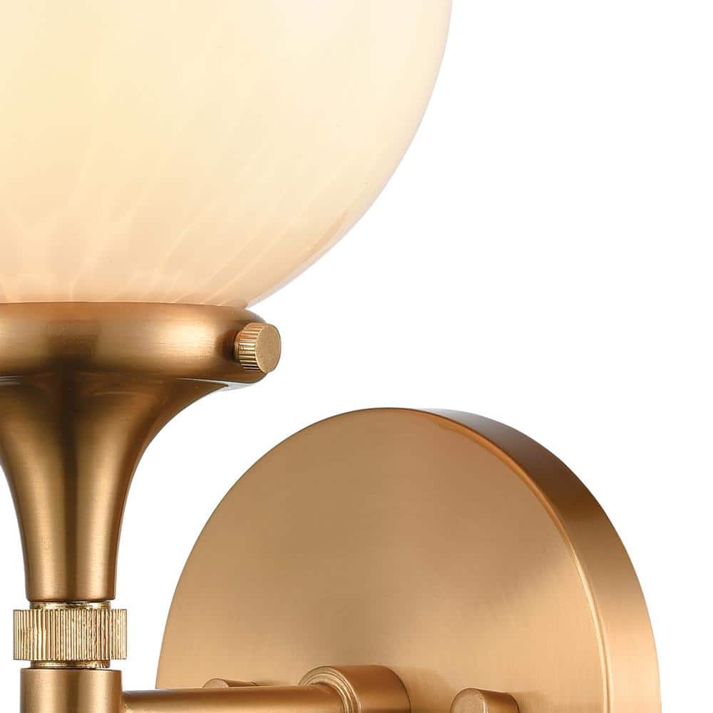 Satin Brass Globe Sconce with Feathered Glass Shade