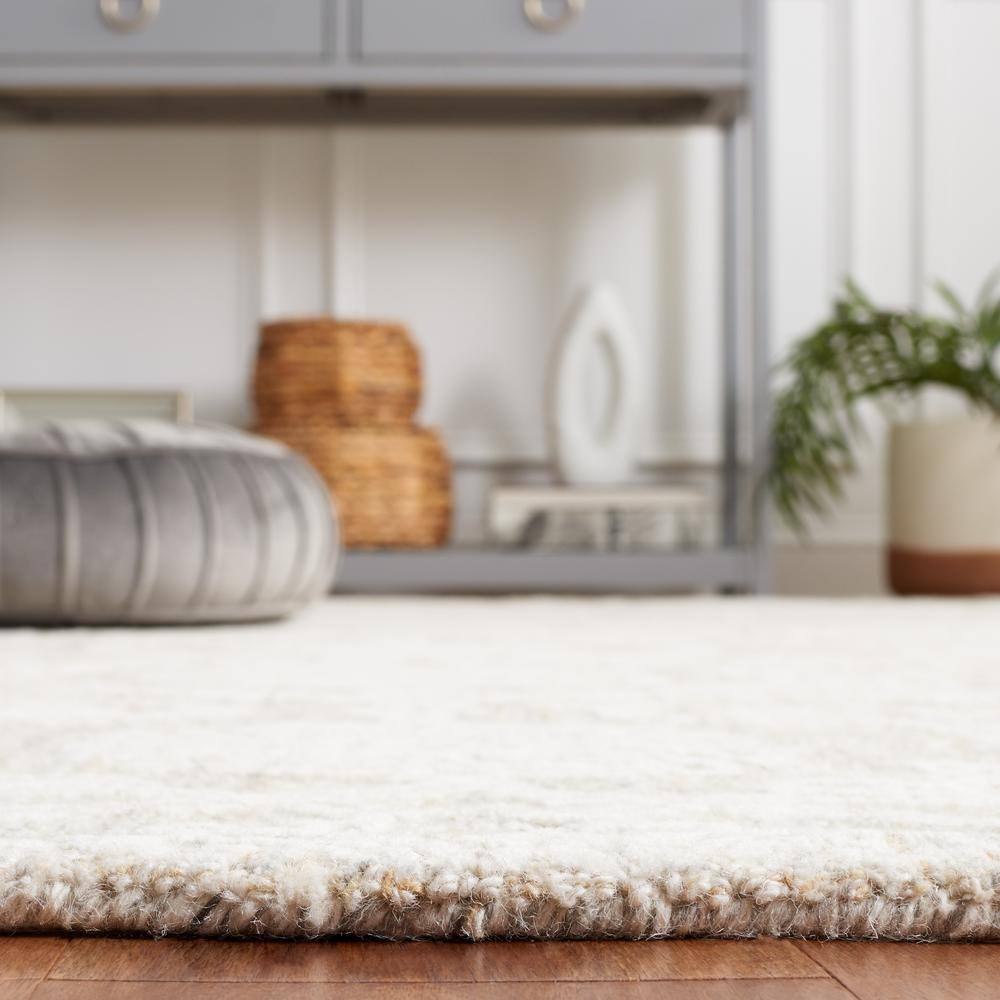 Ivory Tufted Wool 4' x 6' Rectangular Area Rug