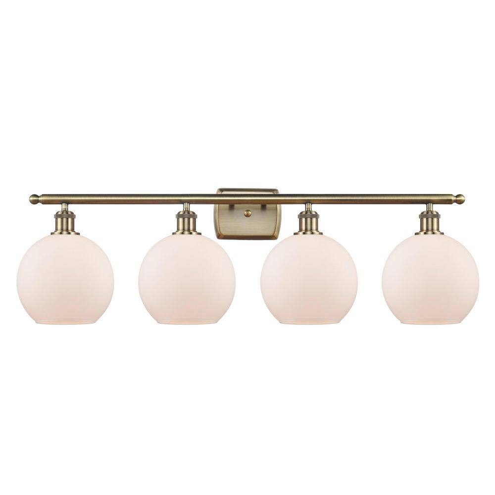 Athens 36 in. 4-Light Antique Brass Vanity Light with Glass Shade price history on PriceWatchPro