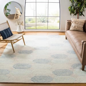 Abstract Ivory/Blue 6 ft. x 9 ft. Oblong Geometric Area Rug
