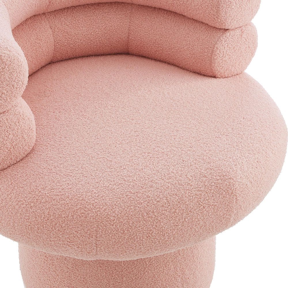 Close-up of the seat and backrest of a pink teddy fabric chair.