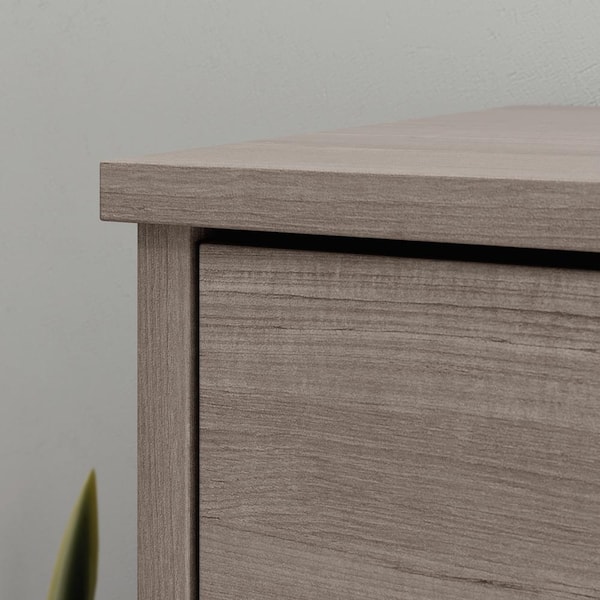 https://images.thdstatic.com/productImages/aae7485b-bfb3-4fa3-be90-ef12b581afef/svn/silver-sycamore-sauder-chest-of-drawers-428231-4f_600.jpg