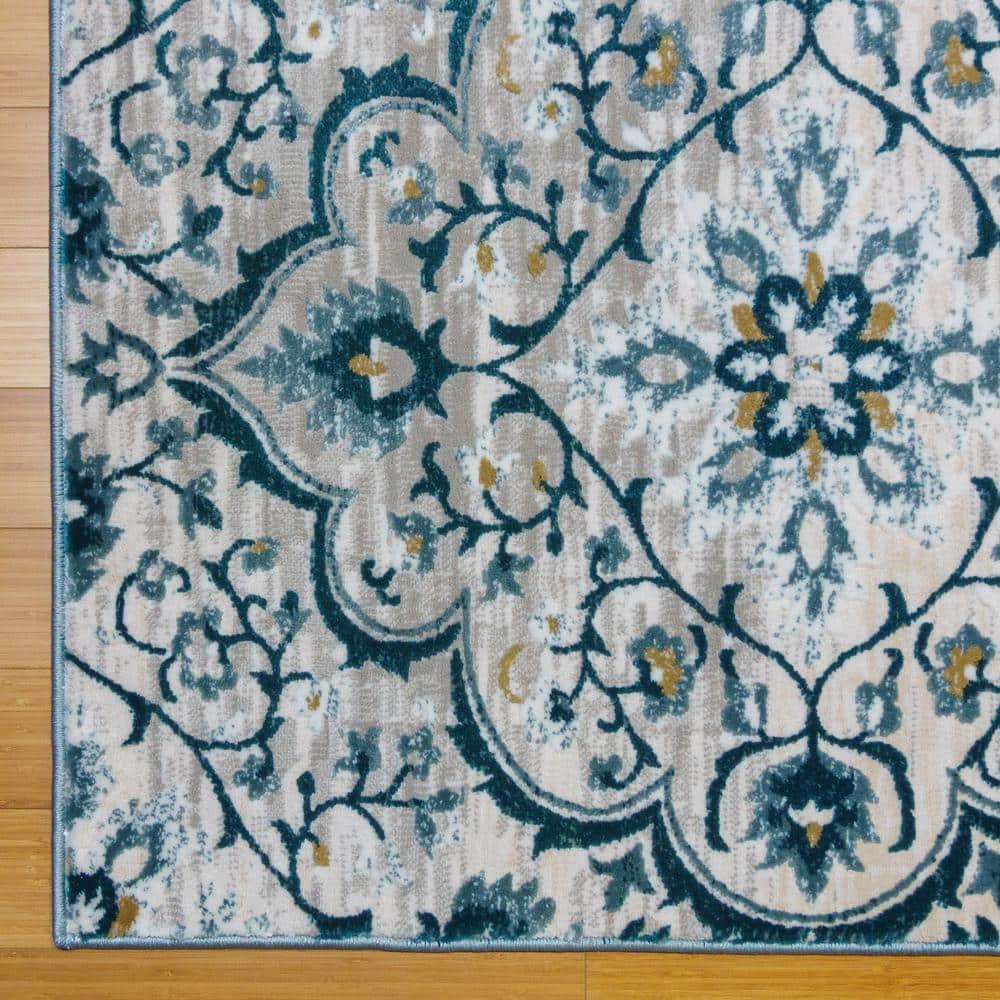 Tunny Blue and White Synthetic 5' x 7' Area Rug