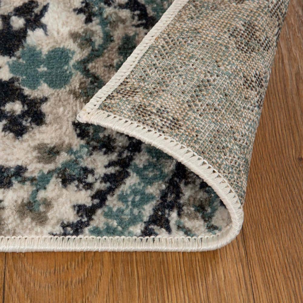 Deep Royal Floral Synthetic 7' x 9' Area Rug