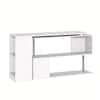 Rear view of a white L-shaped computer desk showing the shelving structure.