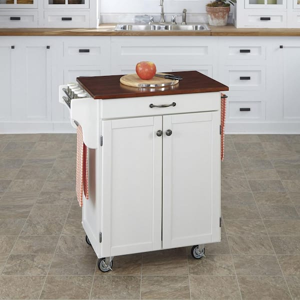 https://images.thdstatic.com/productImages/ab4e1bb1-1213-4608-b51a-57ed03bb6deb/svn/white-with-cherry-top-homestyles-kitchen-carts-9001-0027g-c3_600.jpg