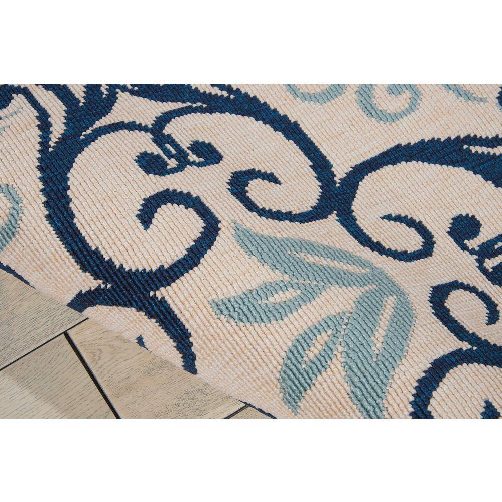 Ivory and Navy Floral Synthetic 5' x 7' Area Rug