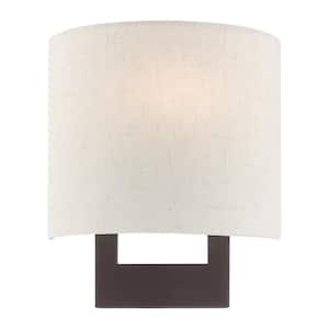 Hayworth 8 in. 1-Light Bronze ADA Wall Sconce with Oatmeal Fabric Shade