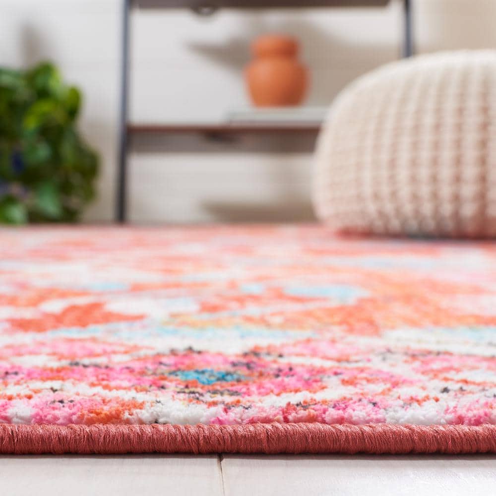Orange and Light Blue 8' x 10' Synthetic Washable Area Rug