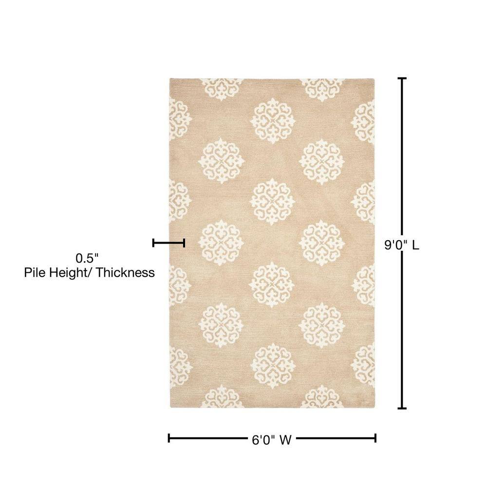 Beige and Ivory 6' x 9' Hand-Tufted Wool and Viscose Area Rug