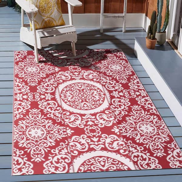 https://images.thdstatic.com/productImages/aba93ba9-5c52-41f9-9336-9b4b64ab4857/svn/red-and-white-nuu-garden-outdoor-rugs-so06-01-e1_600.jpg