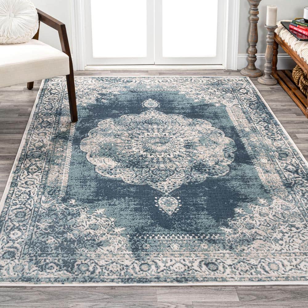 Ivory and Blue Medallion 8' x 10' Synthetic Area Rug