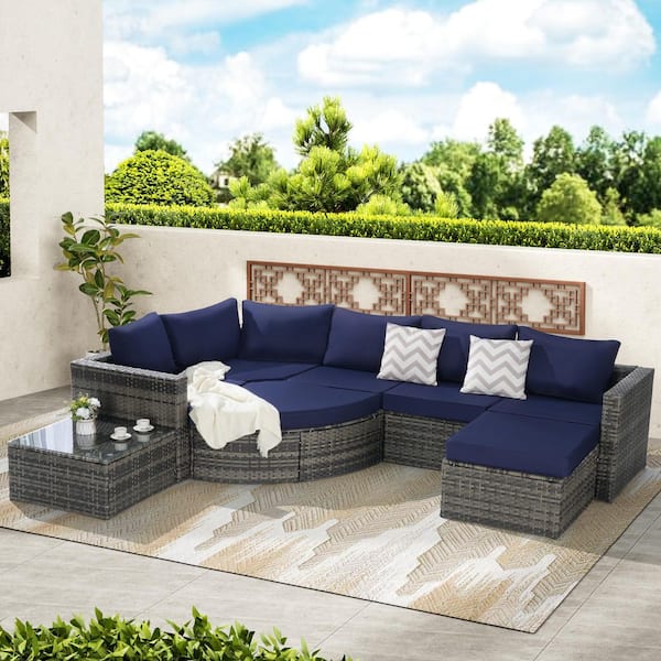 8-Piece L-Shaped Gray Wicker Outdoor Patio Sectional Sofa Set with Dark Blue Cushions and 1 Coffee Table