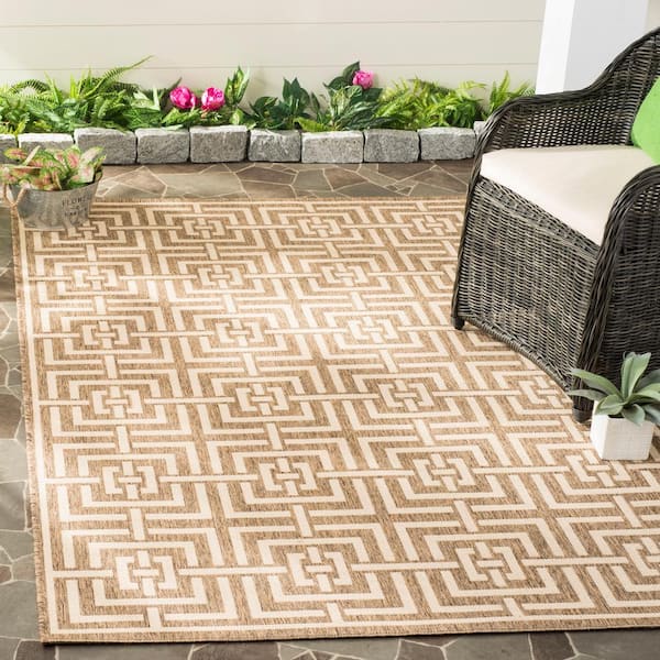 https://images.thdstatic.com/productImages/abbd0724-1387-44c7-9c2a-bfbf68ac596b/svn/beige-cream-safavieh-outdoor-rugs-bhs128d-6-e1_600.jpg