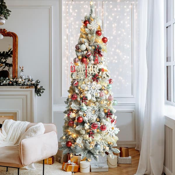 Christmas Winter Wonderland Decorations  White flocked christmas tree,  Winter wonderland decorations, Red and gold christmas tree