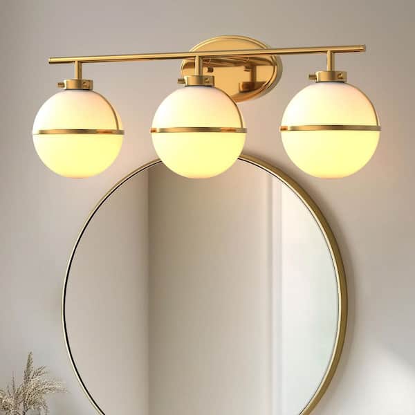 24 in. Modern Inspired 3-Light Bathroom Vanity Light with Elegant Heritage Brass Globe Shade