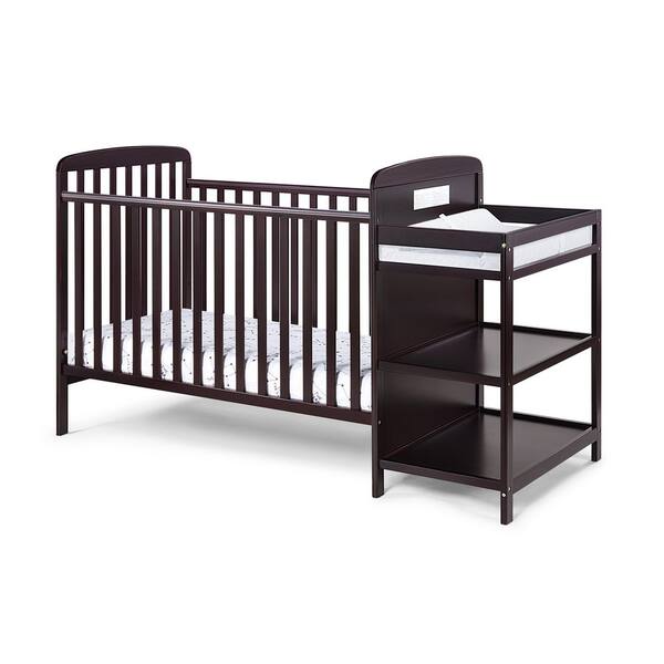 Cot with outlet change table attached