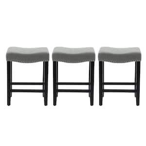 Jameson 24 in. Counter Height Black Wood Backless Nailhead Barstool with Upholstered Gray Linen Saddle Seat (Set of 3)