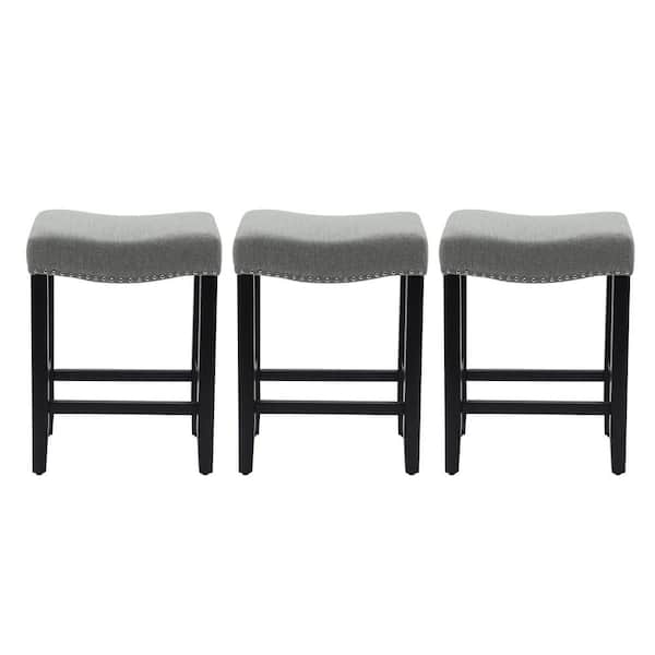 WESTINFURNITURE Jameson 24 in. Counter Height Black Wood Backless Nailhead Barstool with Upholstered Gray Linen Saddle Seat (Set of 3)