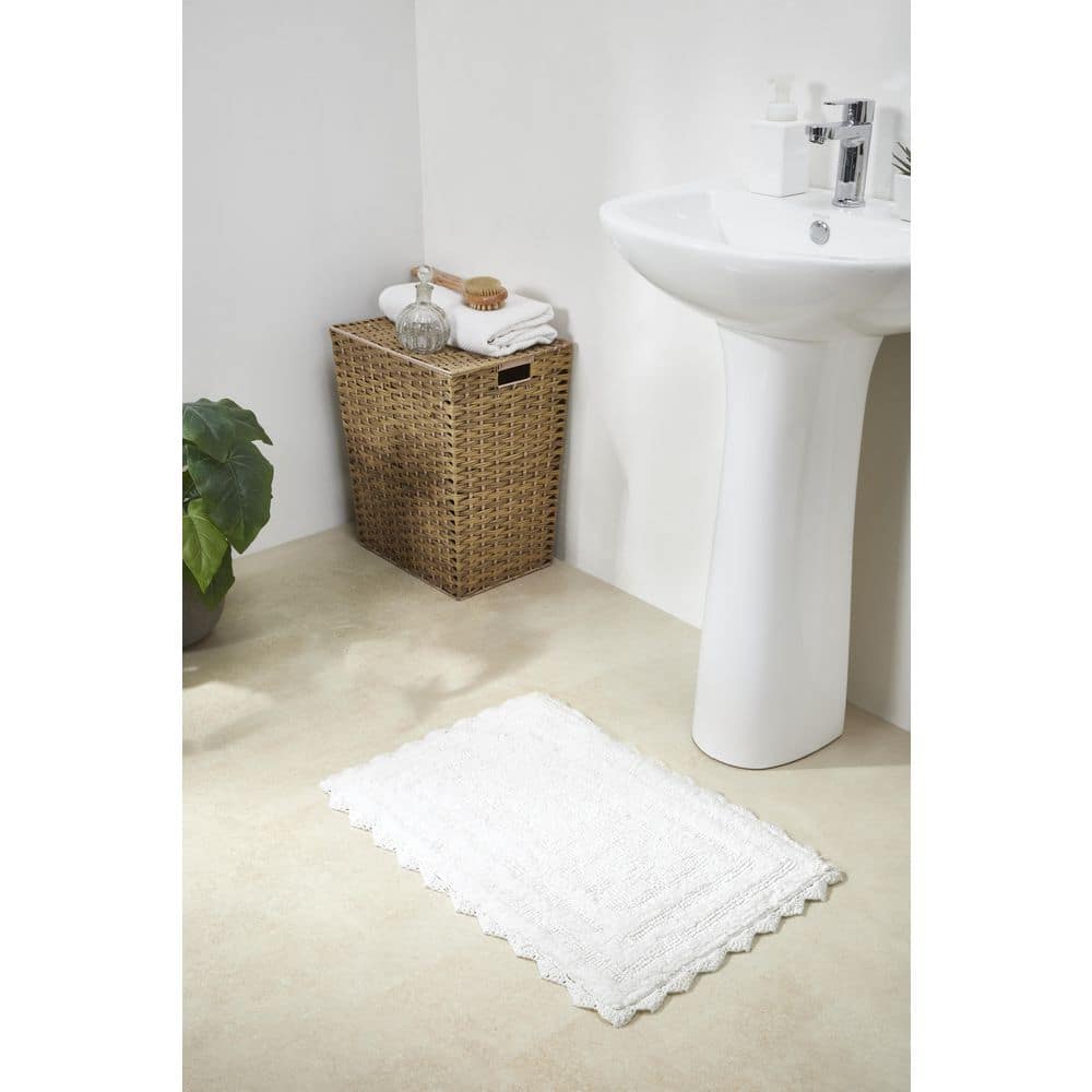 https://images.thdstatic.com/productImages/abe8b7ab-73c2-4fe8-9a7e-68c9f78b656c/svn/white-better-trends-bathroom-rugs-bath-mats-balil1724wh-64_1000.jpg