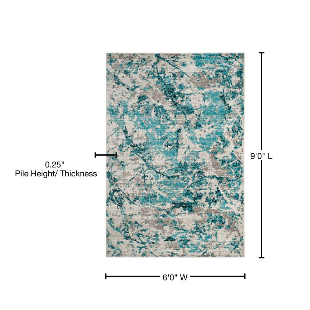 Vibrant Blue and Ivory Abstract Synthetic 6' x 9' Area Rug