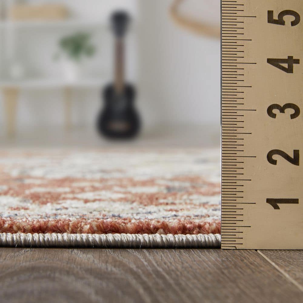 Red and Beige 4' x 6' Synthetic Oriental Area Rug