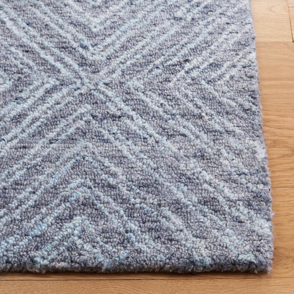 Handmade Blue Abstract Tufted Wool Rectangular Rug 27" x 4"