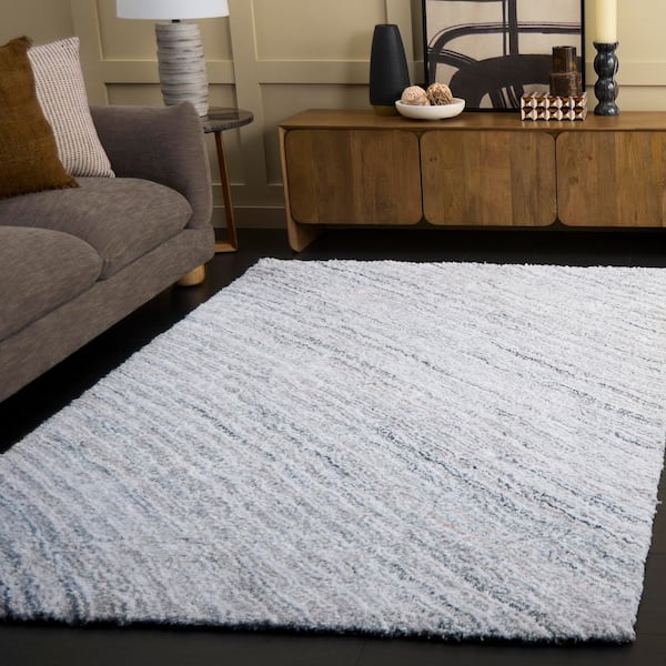 Glory Shag 9 ft. x 12 ft. Ivory/Light Blue Abstract Wavy Area Rug