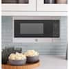 Condition photo showing New/Like New for GE 0.7 cu. ft. 700-Watt Spacemaker Countertop Microwave in Stainless Steel