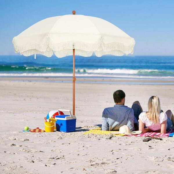 7 ft. Metal Tilt Beach Umbrella in Ivory with Fringe Z0CKYWX2QR