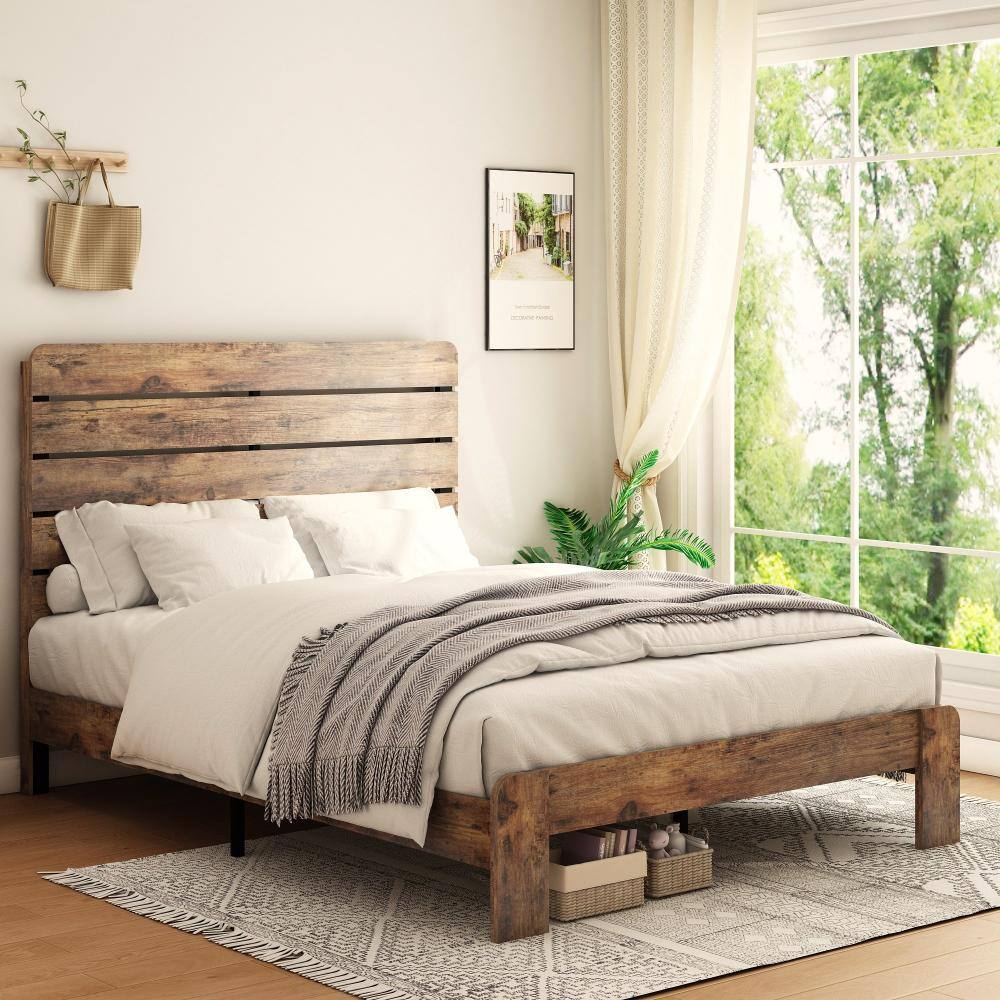 Bedroom setting with a wooden platform bed by a window.