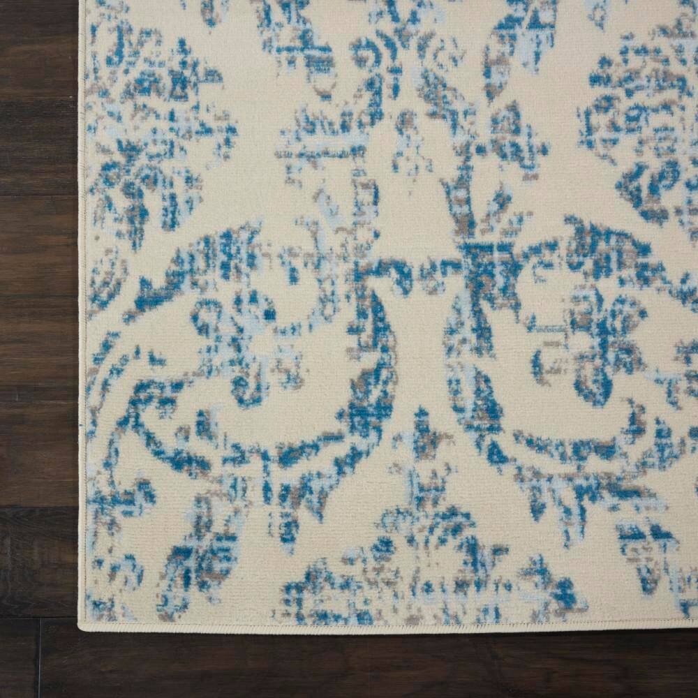 Elegant Ivory and Blue Damask 7' x 10' Synthetic Area Rug