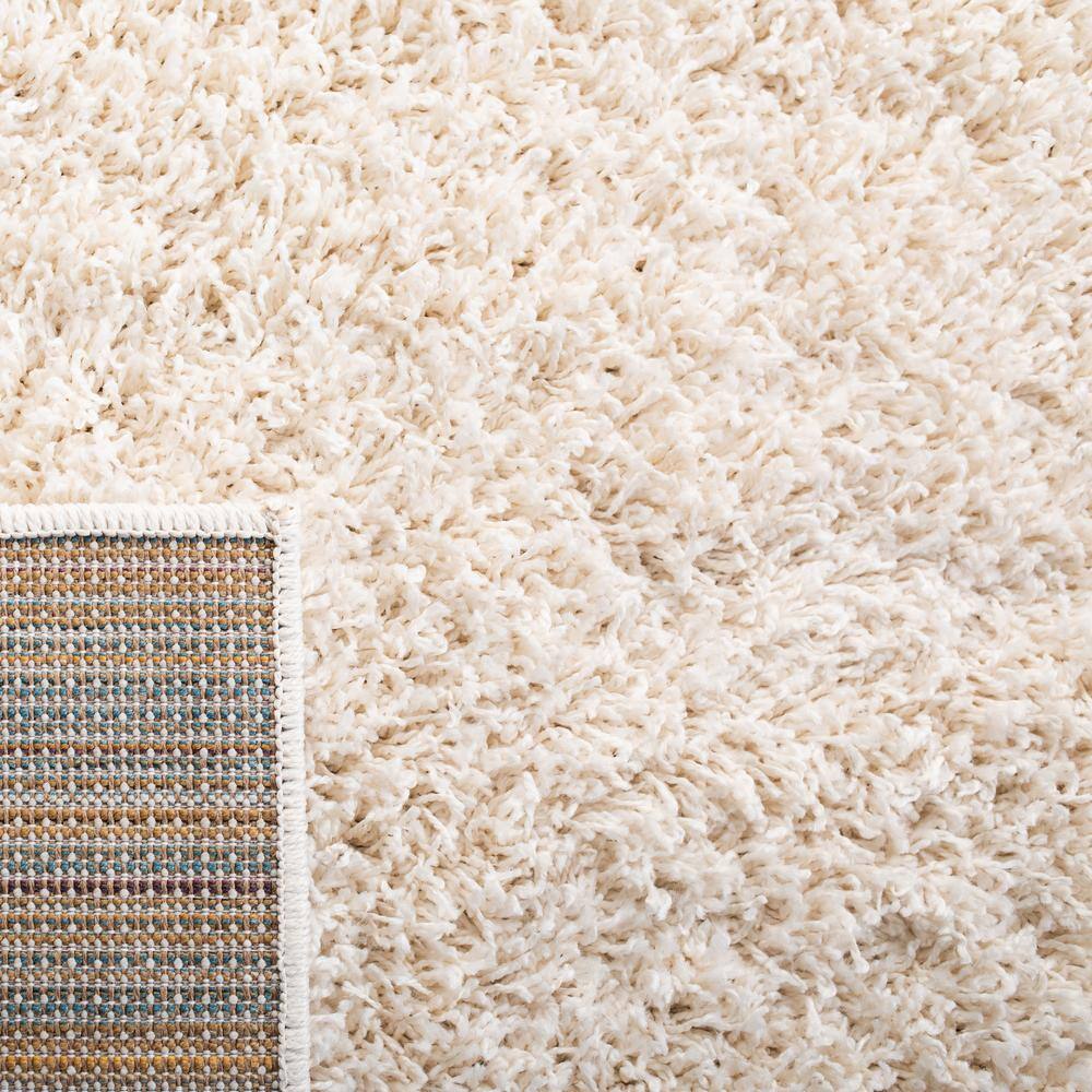 Elysian Ivory 9' x 12' Hand-Knotted Shag Area Rug