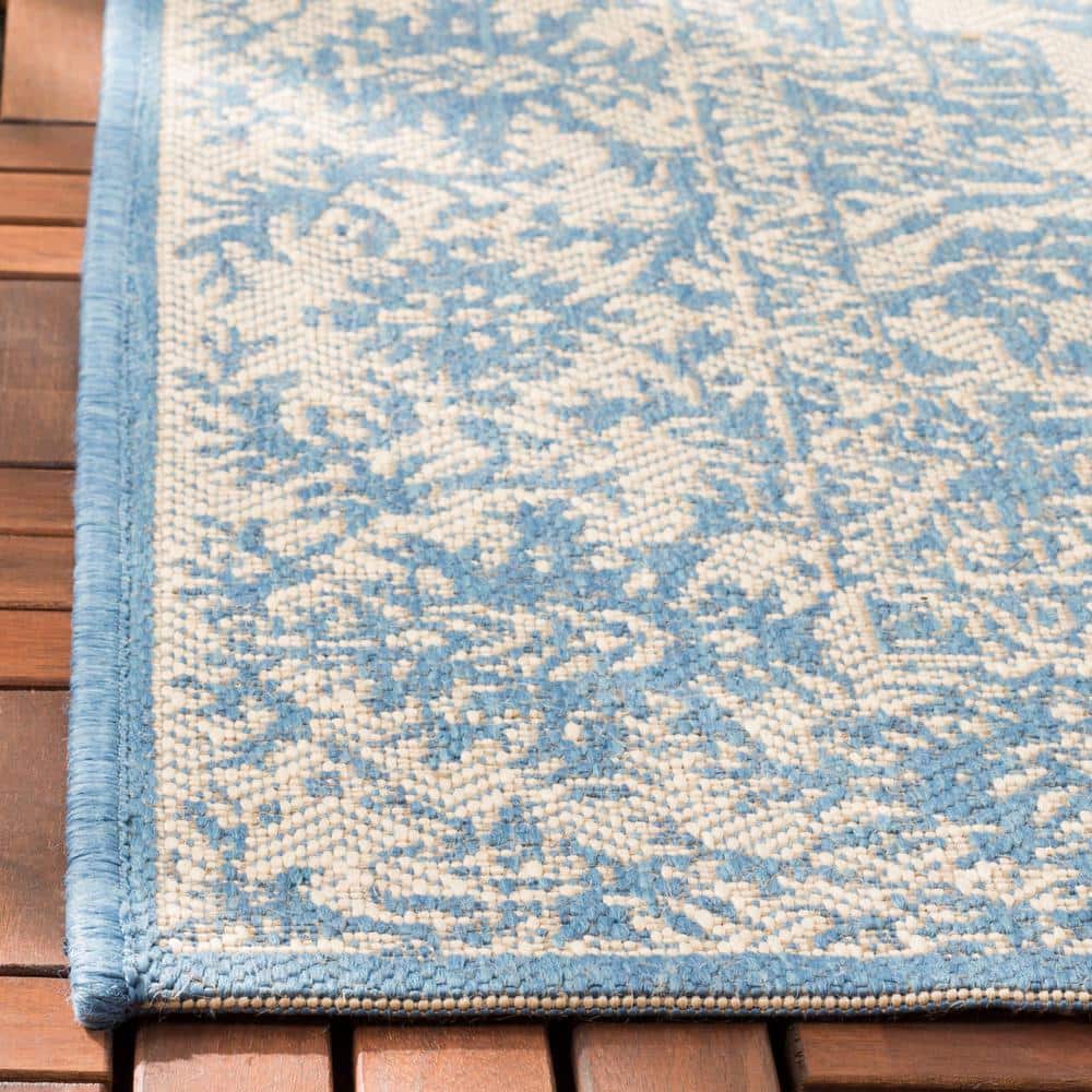Valene Easy-Care Blue Synthetic 4' x 6' Outdoor Rug