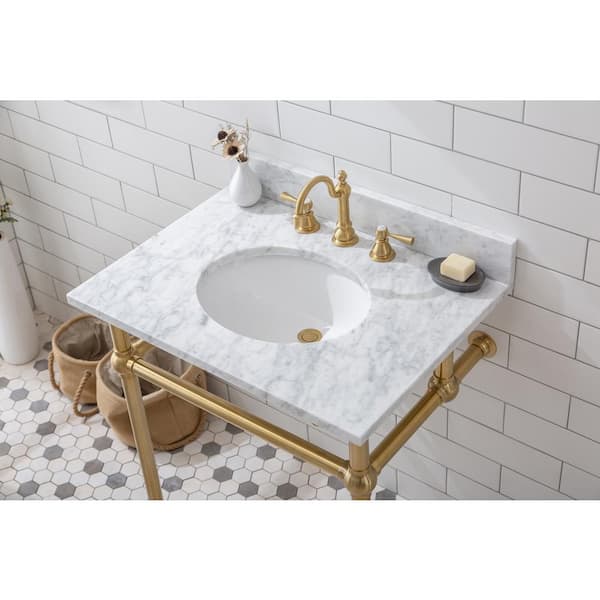 https://images.thdstatic.com/productImages/ac355f51-645b-427f-80d8-c4e2aa3e8edf/svn/satin-brass-water-creation-console-sinks-eb30e-0612-44_600.jpg