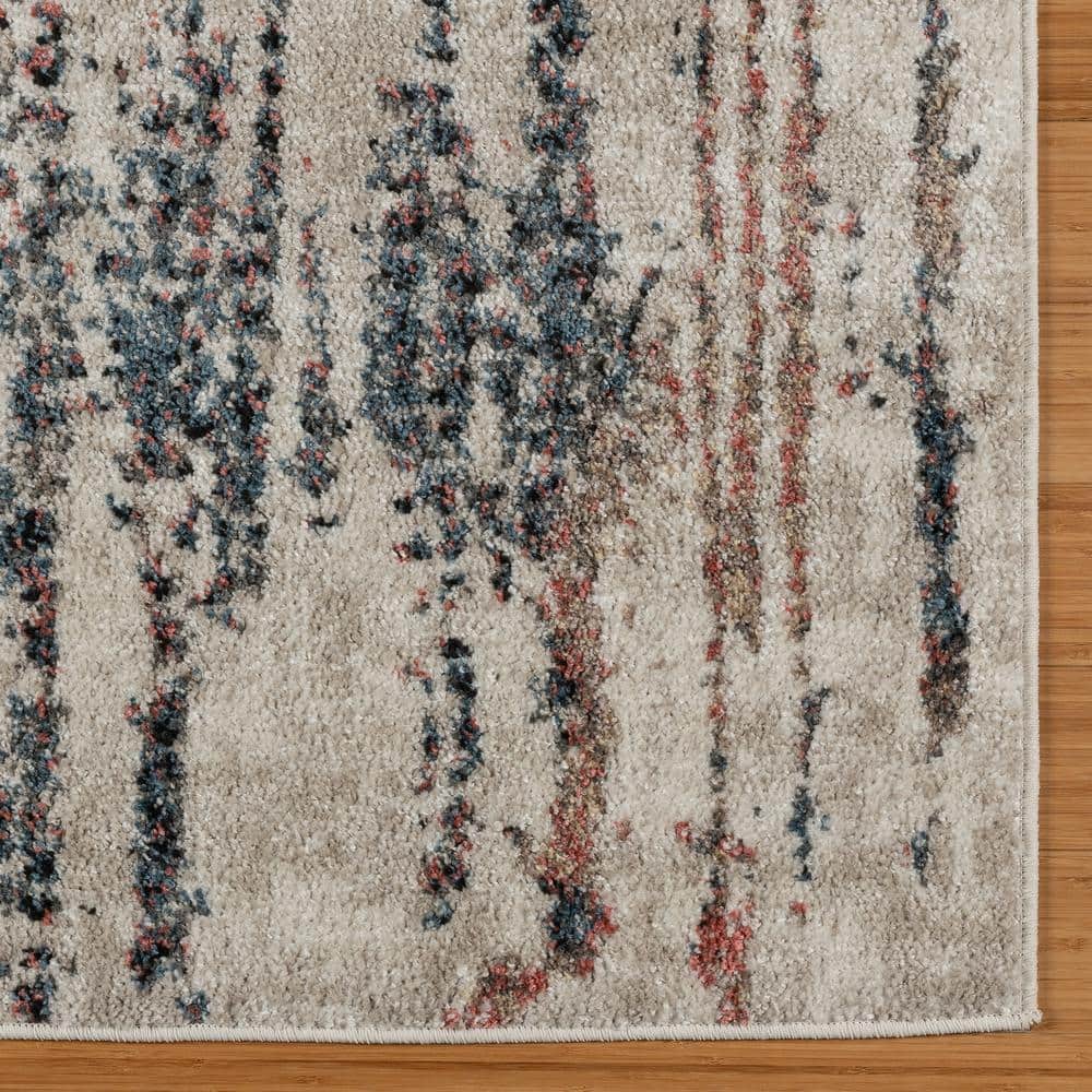 Ivory and Multicolor Tufted Synthetic Area Rug 8'9" x 13'