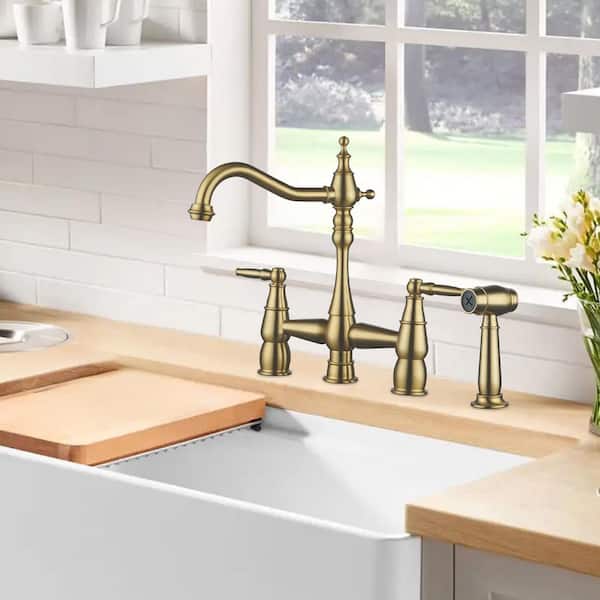 Brass Double Handle Bridge Kitchen Faucet with Side Sprayer in Gold