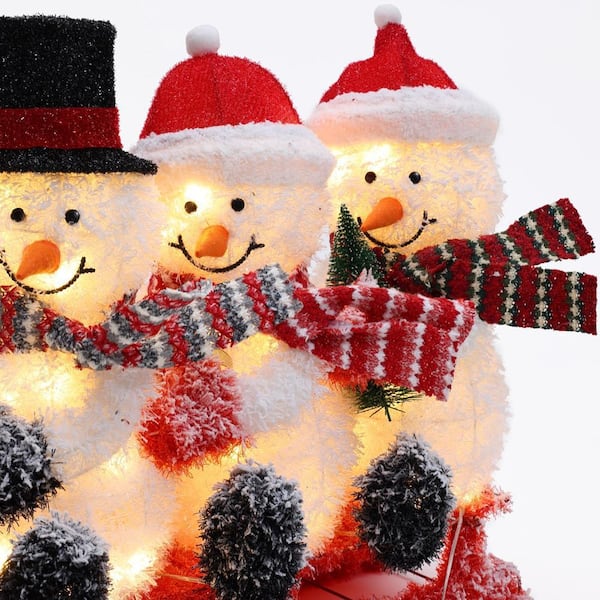 LuxenHome 20.4 in. H Snowman Family Trio on Sled with Outdoor