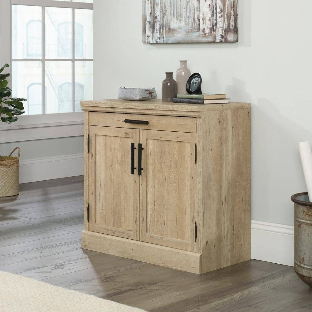 https://images.thdstatic.com/productImages/ac72b75a-5f49-4dd7-bae5-a6ee42934796/svn/prime-oak-sauder-accent-cabinets-427015-64_1000.jpg