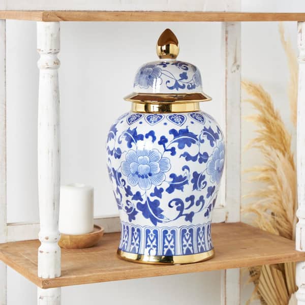 Litton Lane Blue Ceramic Floral Decorative Vase with Cut Out