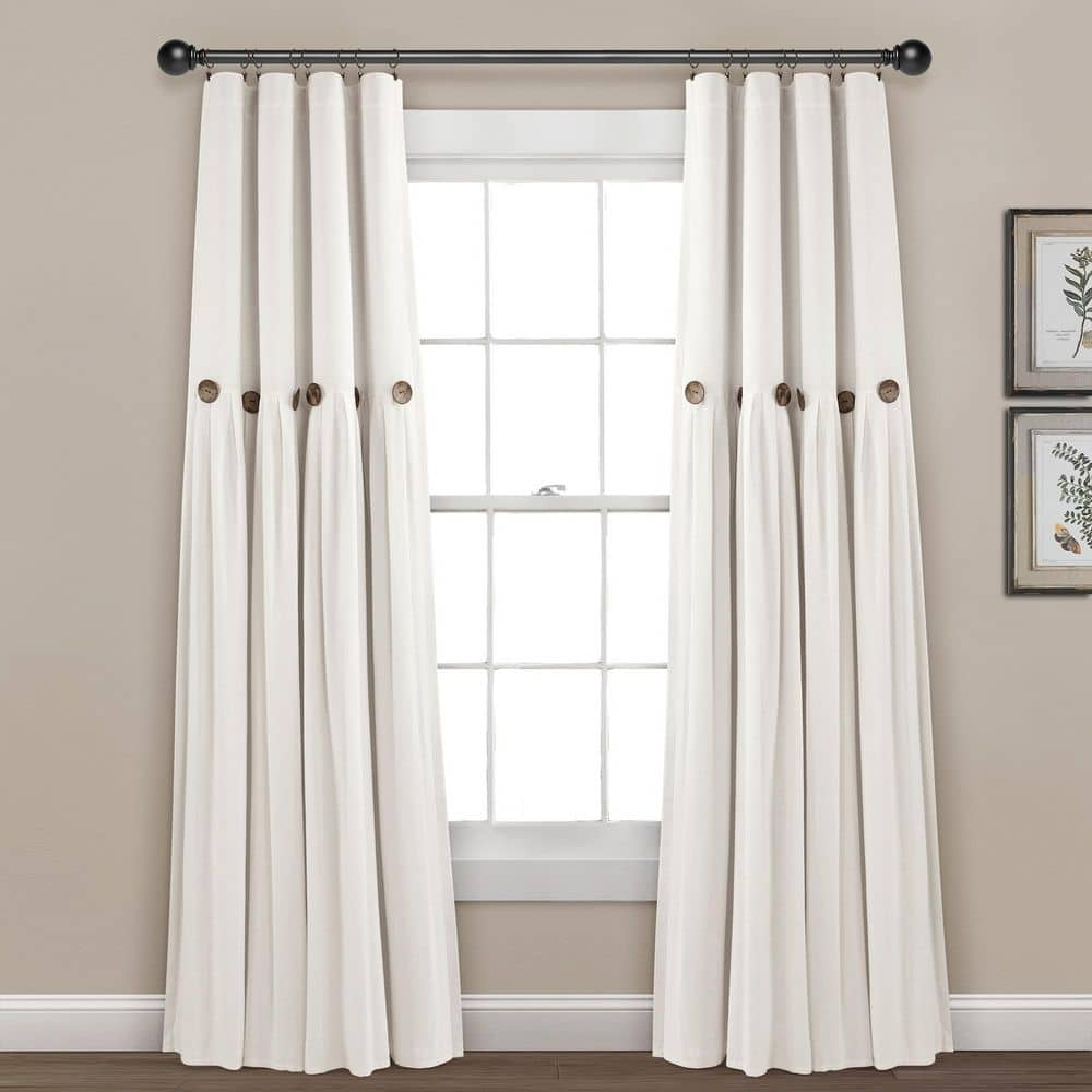 https://images.thdstatic.com/productImages/ac7e2dd2-3589-45a7-8726-3e5789ea76ec/svn/off-white-homeboutique-blackout-curtains-21t012060-64_1000.jpg