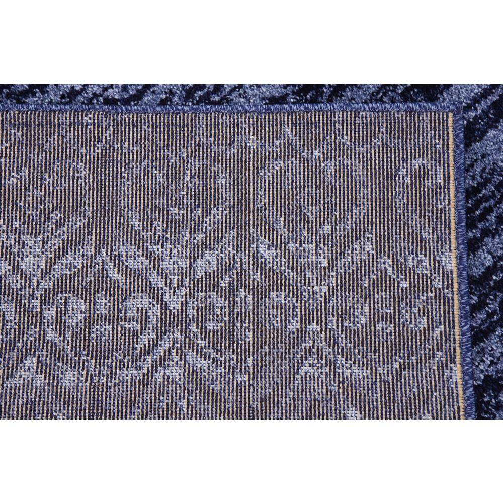 Blue Tufted Washable Reversible 6' x 9' Synthetic Rug