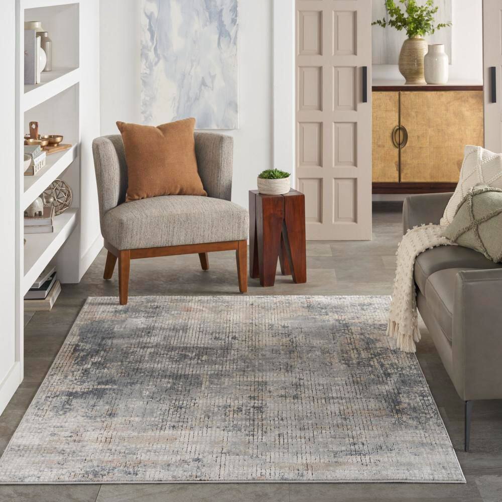 Concerto Blue and Beige Abstract Synthetic 5'3" x 7'3" Area Rug