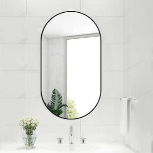 36 in. W x 18 in. H Small Oval Steel Framed Wall Bathroom Vanity Mirror in Black