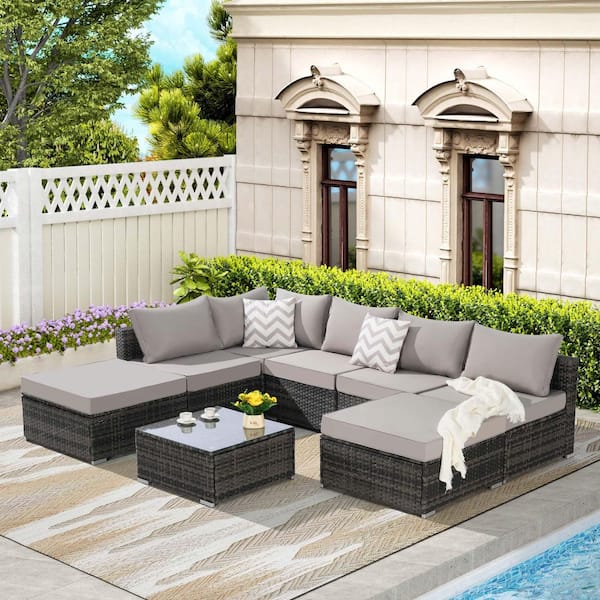 Zeus & Ruta 8-Piece Outdoor Wicker Conversation Sets with Light Gray Cushions and Glass Coffee Table for Garden